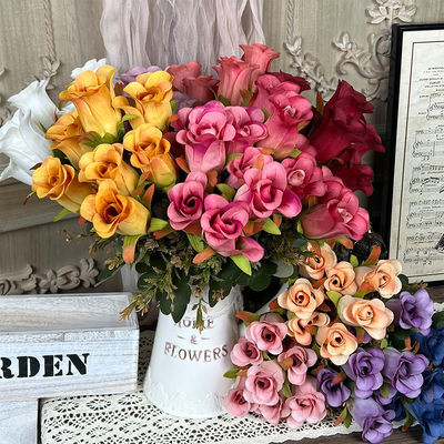 satın al Düğünler için üst düzey bir hisle simüle edilen 7 başlı yapay sahte ipek buketi, oturma odalarında dekoratif çiçek düzenlemesi, plastik güller Çevrimiçi üretim