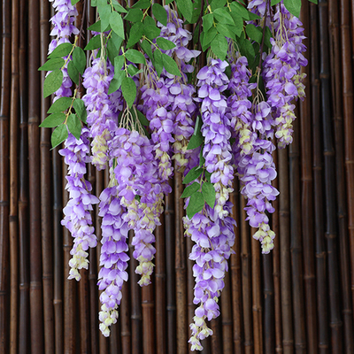 İyi bir fiyat. Uzun dalları olan devasa wisteria çiçeklerinin simülasyonu, plastik sahte çiçekler, ipek çiçekleri, kapalı oturma odası, asılı rattan şeritleri, fotoğraf dekorasyonu çevrimiçi