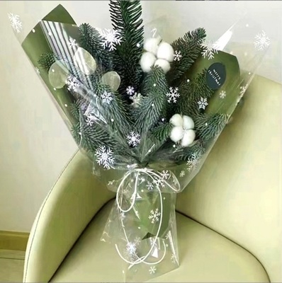 İyi bir fiyat. Noel su geçirmez kar tanesi selofan çiçek dükkanı, Noel arifesinde çiçek buketleri, hediyeler, elma ambalajlama fabrikası toptan ve doğrudan satış çevrimiçi